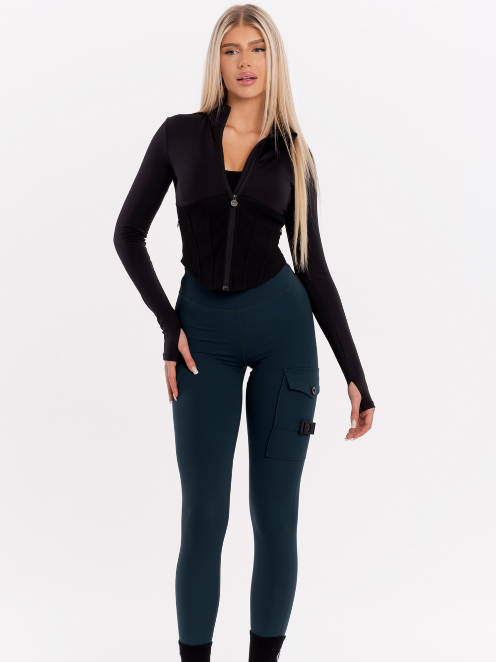 Ciemnozielone legginsy damskie z kieszeniami i klamrą