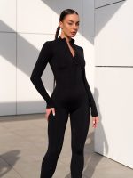Sporty black jumpsuit with zipper in the front in soft , stretchy fabric