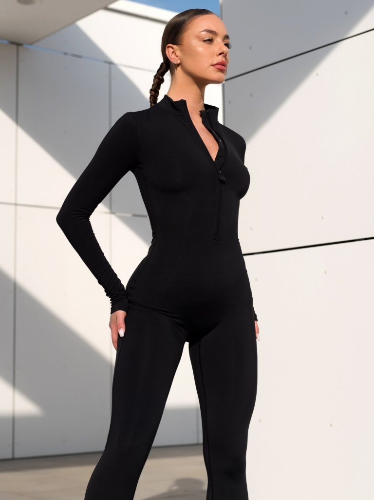Sporty black overalls with zipper and Peach Pump logo