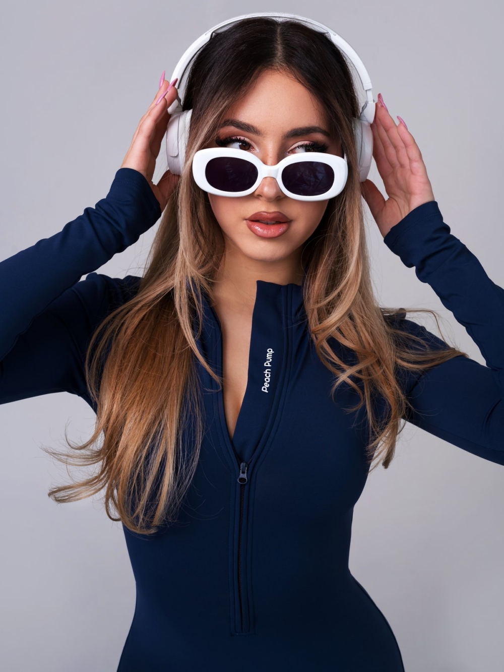 Sports Fleece Dark Blue Jumpsuit fitting the body Peach Pump