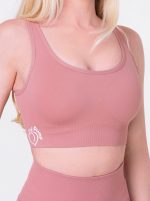 Pink sports bra with built-in padding from seamless fabric