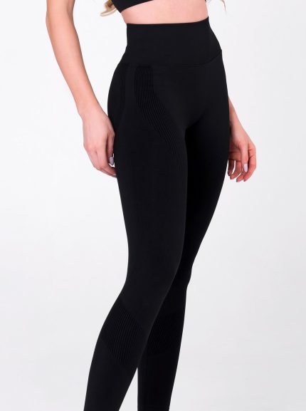 Black sports set, shaping leggings and push-up sports bra made of seamless fabric