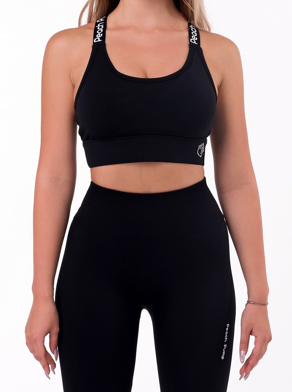 Fekete párnázott sportmelltartó Peach Pump felirattal