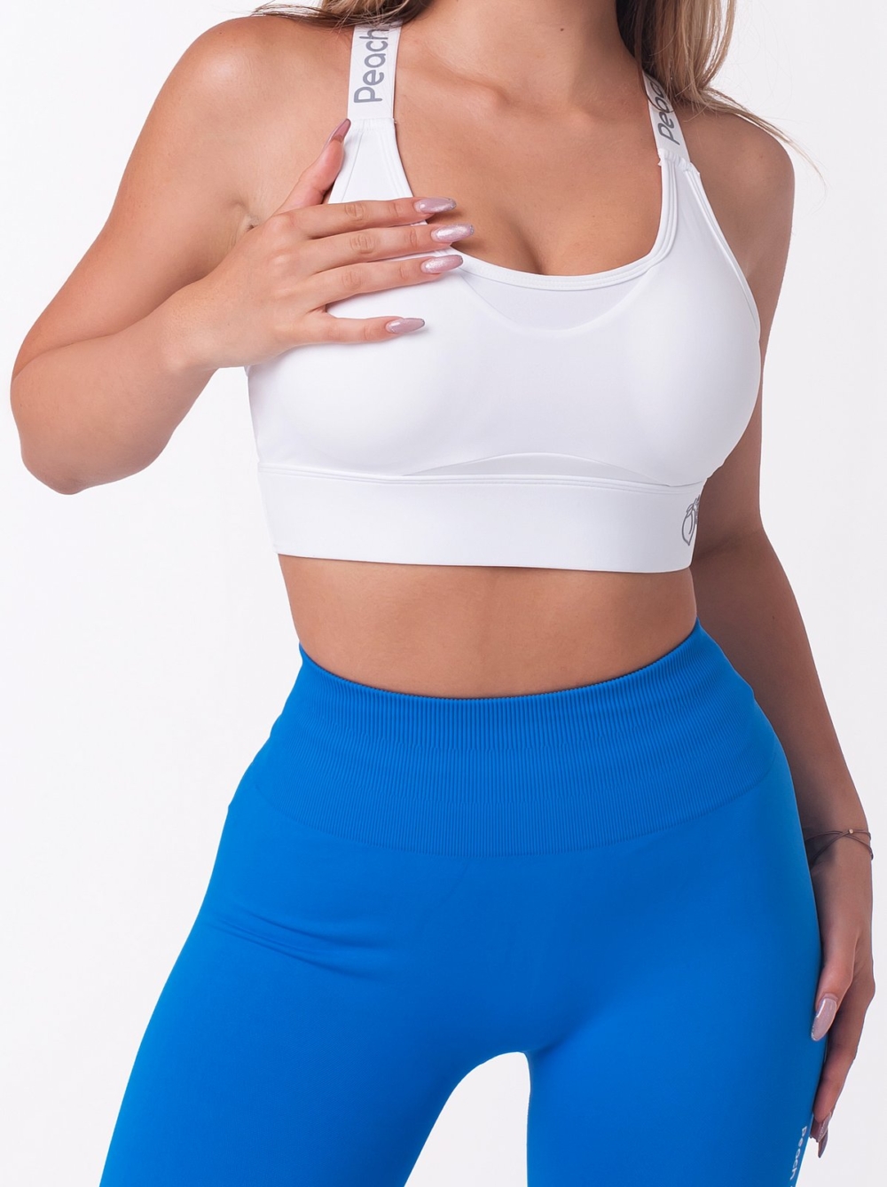 White push-up Peach Pump sports bra with cross back and multi-stage fastening