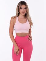 Light pink sports bra with Push-up padding, multi-stage fastening and white lettering on the straps