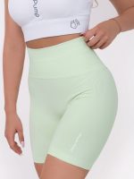 Women's short leggings in light green with Peach Pump logo on the waist