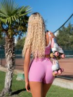 Short shaping leggings in pink with "Peach Pump" logo
