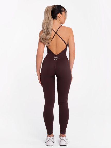 Brown seamless sports jumpsuit with a spectacular cross back with adjustable straps