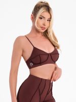 Brown sports bra with inverted seams and padding with push-up effect