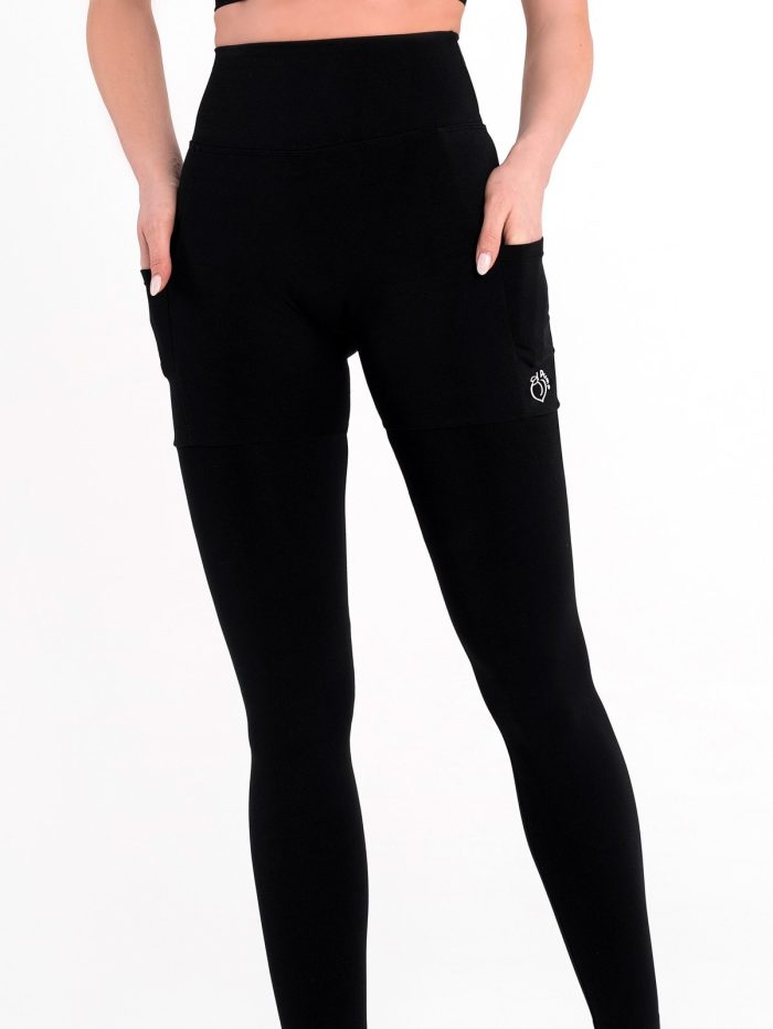 Women's black leggings with pockets made of elastic , seamless fabric