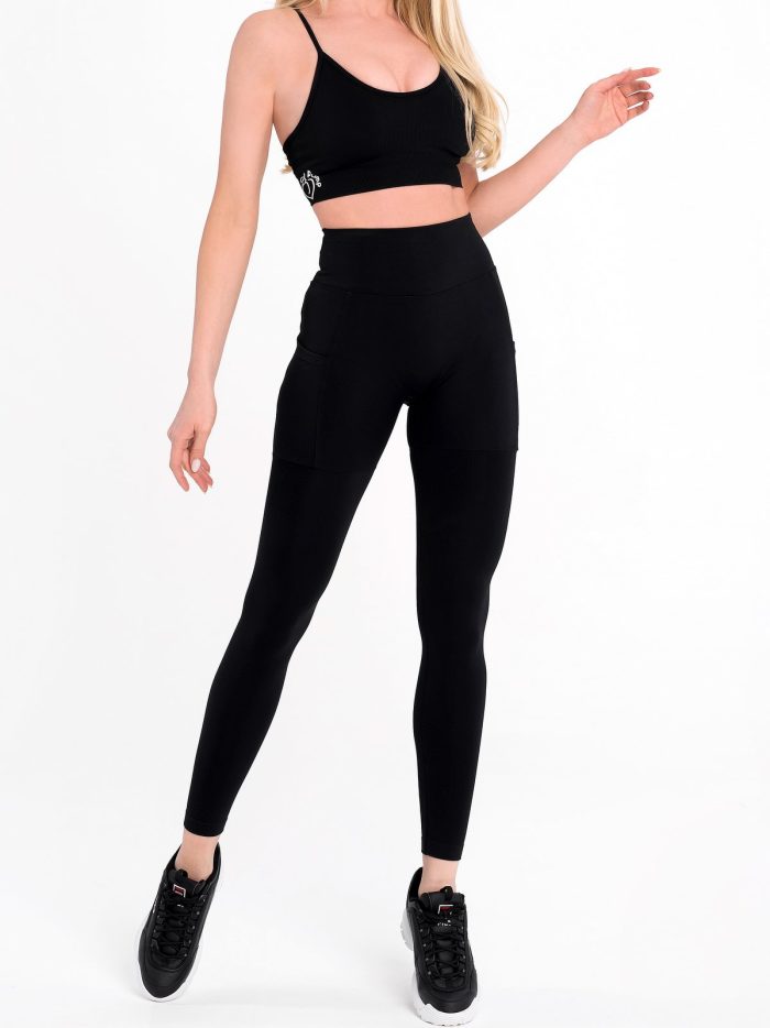 Shaping , elastic leggings with two side pockets in black colour