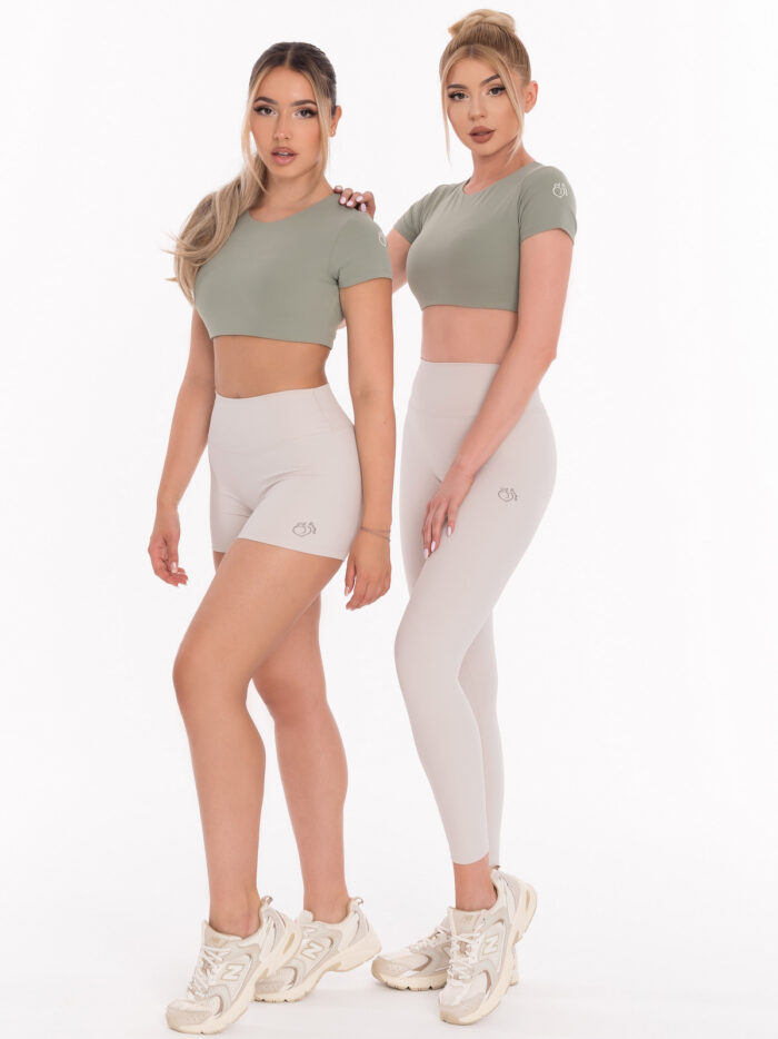 Elastické béžové športové legíny so stredným pásom na fitness a jógu