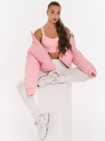Women's pink sports bra with padding and Peach Pump lettering along the length