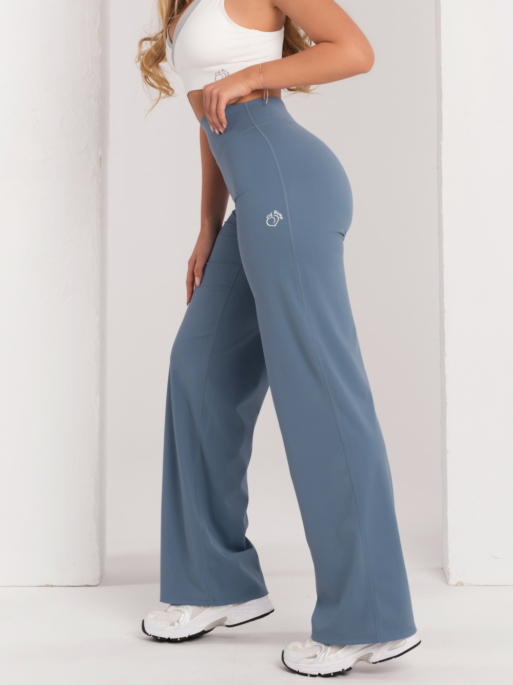 Női sportleggings bő szabással fitneszhez