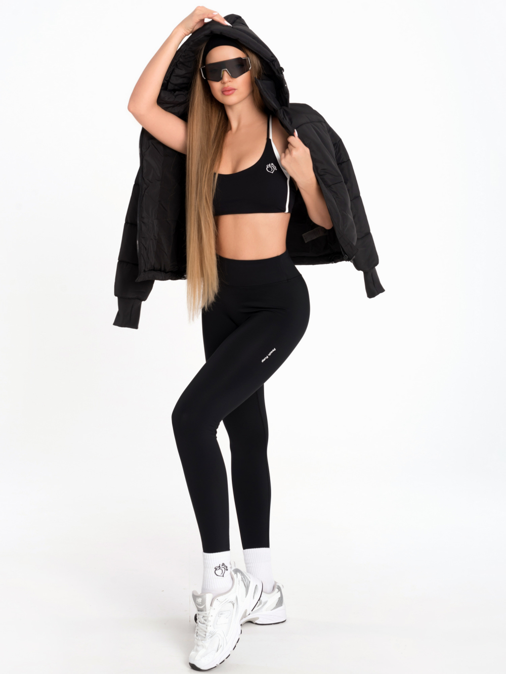 Női, fekete, közepes derékrésszel rendelkező sportleggings, sűrű szövésű és rugalmas, átlátszatlan anyagból
