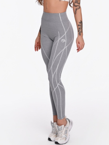 Szürke női leggings az izomzat vonalát követő fehér kontrasztvarrással