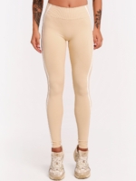Beige shaping leggings with contrast shaping lines that enhance the curves.